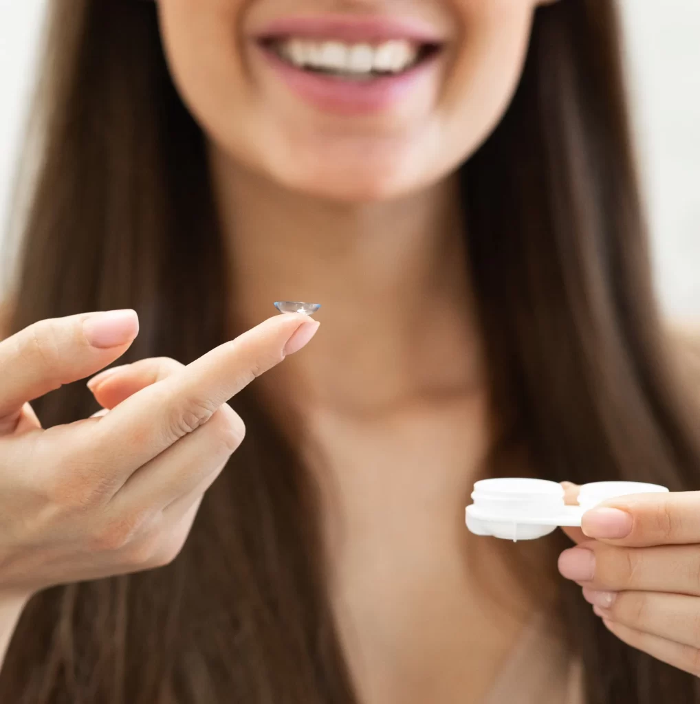 Woman with contact lenses. Woman with contact lenses elios optical