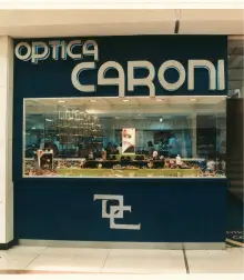 a store front with a sign Elios optical
